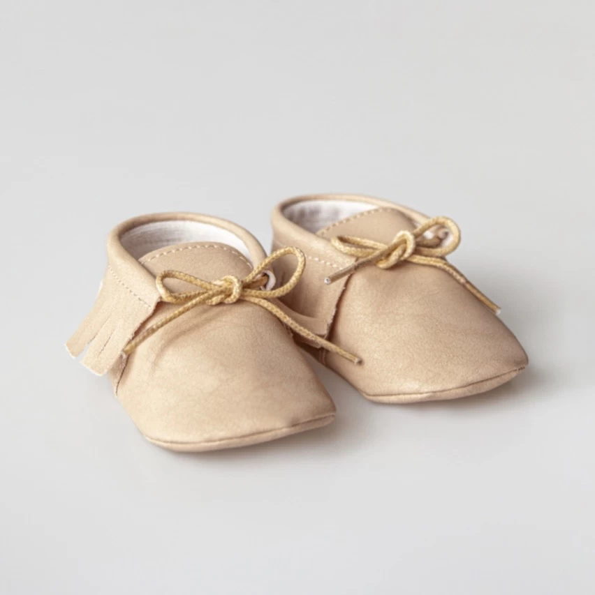 Beige baby shoes