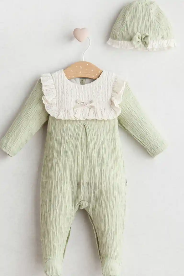 Green overall with a hat